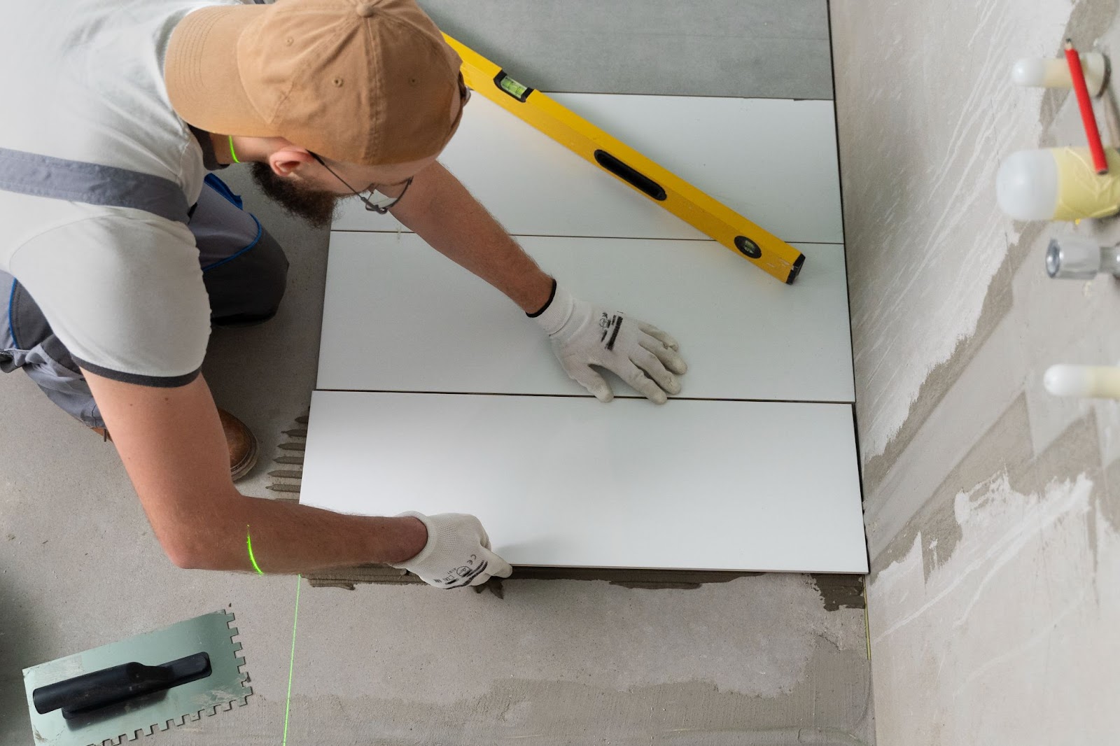 best tile installation tiler-working-renovation-apartment_